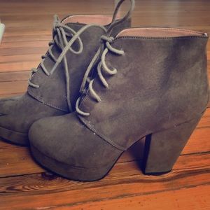 Army green lace-up booties. 3.5 inch heel.